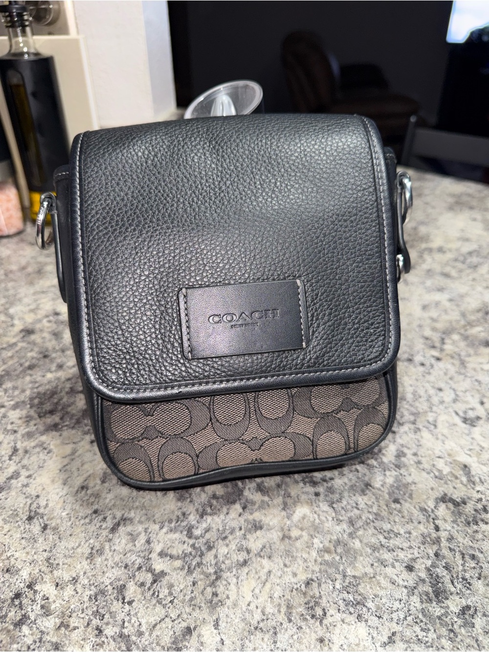 Coach Black Pebbled Leather Crossbody with Signature Brown Canvas Accent